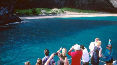 People touring Honopu valley