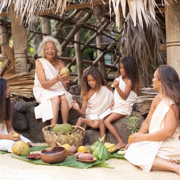 Leon Thomas III et al. sitting at a zoo