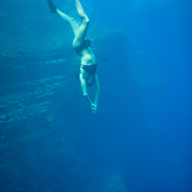 a man swimming in the water