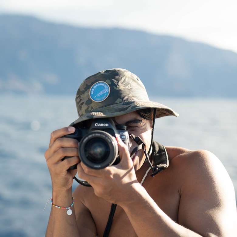 a person holding a camera